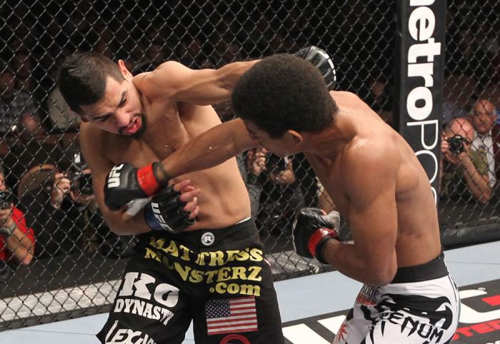 LAS VEGAS, NV - FEBRUARY 04: (L-R) Edwin Figueroa and Alex Caceres during the UFC 143 event at Mandalay Bay Events Center on February 4, 2012 in Las Vegas, Nevada. (Photo by Nick Laham/Zuffa LLC/Zuffa LLC via Getty Images) *** Local Caption *** Edwin Fi