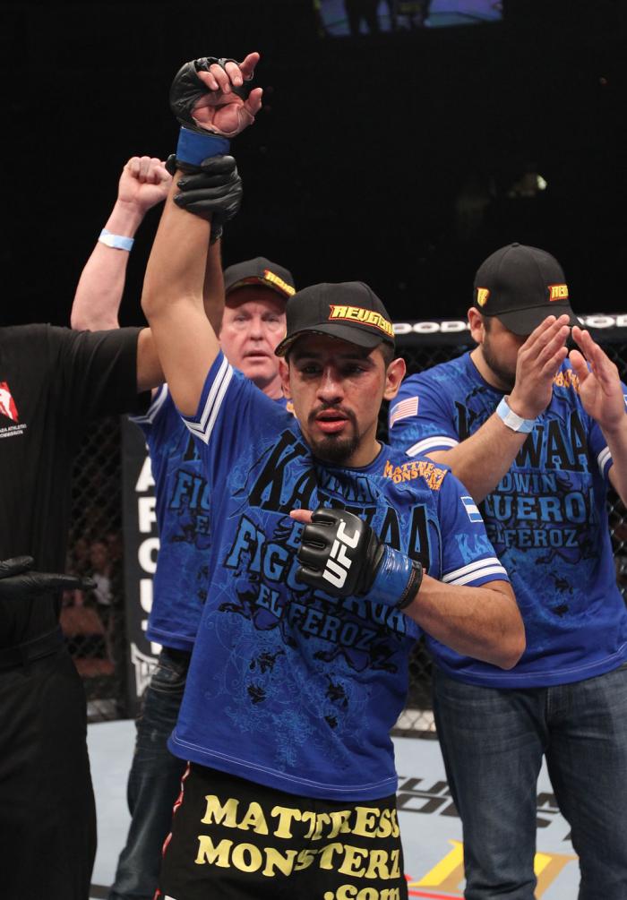 LAS VEGAS, NV - FEBRUARY 04: Edwin Figueroa is declared the winner in his fight against Alex Caceres during the UFC 143 event at Mandalay Bay Events Center on February 4, 2012 in Las Vegas, Nevada. (Photo by Nick Laham/Zuffa LLC/Zuffa LLC via Getty Imag