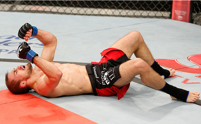 BELO HORIZONTE, BRAZIL - SEPTEMBER 04: Ali Bagautinov reacts after knocking out Marcos Vinicius in their flyweight fight during the UFC on FOX Sports 1 event at Mineirinho Arena on September 4, 2013 in Belo Horizonte, Brazil. (Photo by Josh Hedges/Zuffa