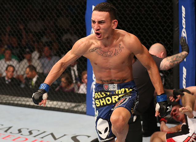 DENVER, CO - AUGUST 11: Max Holloway reacts after knocking out Justin Lawrence during their featherweight bout at UFC 150 inside Pepsi Center on August 11, 2012 in Denver, Colorado. (Photo by Nick Laham/Zuffa LLC/Zuffa LLC via Getty Images)