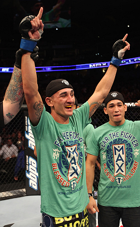 DENVER, CO - AUGUST 11: Max Holloway reacts after knocking out Justin Lawrence during their featherweight bout at UFC 150 inside Pepsi Center on August 11, 2012 in Denver, Colorado. (Photo by Nick Laham/Zuffa LLC/Zuffa LLC via Getty Images)