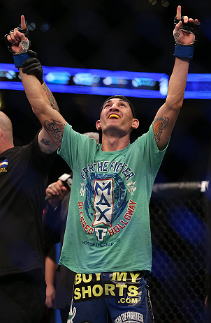 DENVER, CO - AUGUST 11: Max Holloway reacts after knocking out Justin Lawrence during their featherweight bout at UFC 150 inside Pepsi Center on August 11, 2012 in Denver, Colorado. (Photo by Josh Hedges/Zuffa LLC/Zuffa LLC via Getty Images)