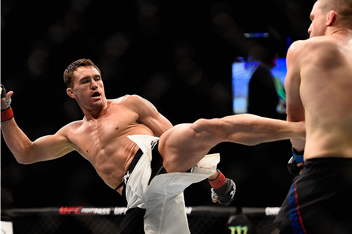 LAS VEGAS, NV - JANUARY 02: (L-R) Kyle Noke of Australia kicks Alex Morono in their welterweight bout during the UFC 195 event inside MGM Grand Garden Arena on January 2, 2016 in Las Vegas, Nevada. (Photo by Jeff Bottari/Zuffa LLC/Zuffa LLC via Getty Ima