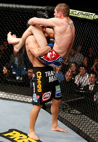 LONDON, ENGLAND - FEBRUARY 16: (R-L) Paul Sass attempts a triangle choke against Danny Castillo in their lightweight fight during the UFC on Fuel TV event on February 16, 2013 at Wembley Arena in London, England. (Photo by Josh Hedges/Zuffa LLC/Zuffa LL