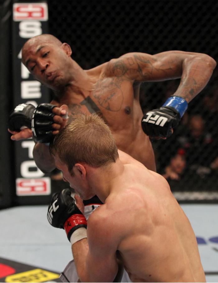 OMAHA, NE - FEBRUARY 15: (R-L) TJ Dillashaw punches Walel Watson during the UFC on FUEL TV event at Omaha Civic Auditorium on February 15, 2012 in Omaha, Nebraska. (Photo by Josh Hedges/Zuffa LLC/Zuffa LLC via Getty Images) *** Local Caption *** TJ Dill