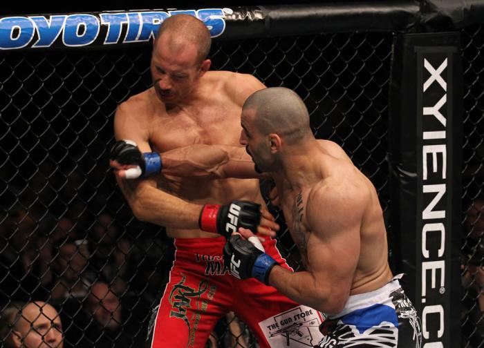 TORONTO, ON - DECEMBER 10: (R-L) Constantinos Philippou punches Jared Hamman during the UFC 140 event at Air Canada Centre on December 10, 2011 in Toronto, Ontario, Canada. (Photo by Nick Laham/Zuffa LLC/Zuffa LLC via Getty Images)
