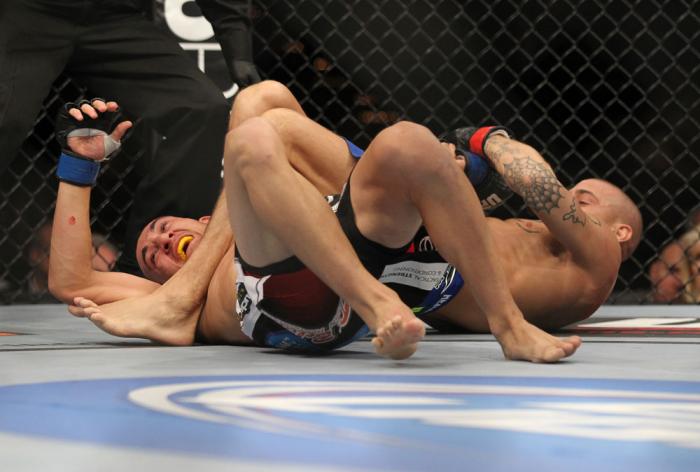 LAS VEGAS, NV - FEBRUARY 04: Dustin Poirier (right) attempts to submit Max Holloway during the UFC 143 event at Mandalay Bay Events Center on February 4, 2012 in Las Vegas, Nevada. (Photo by Josh Hedges/Zuffa LLC/Zuffa LLC via Getty Images) *** Local Ca