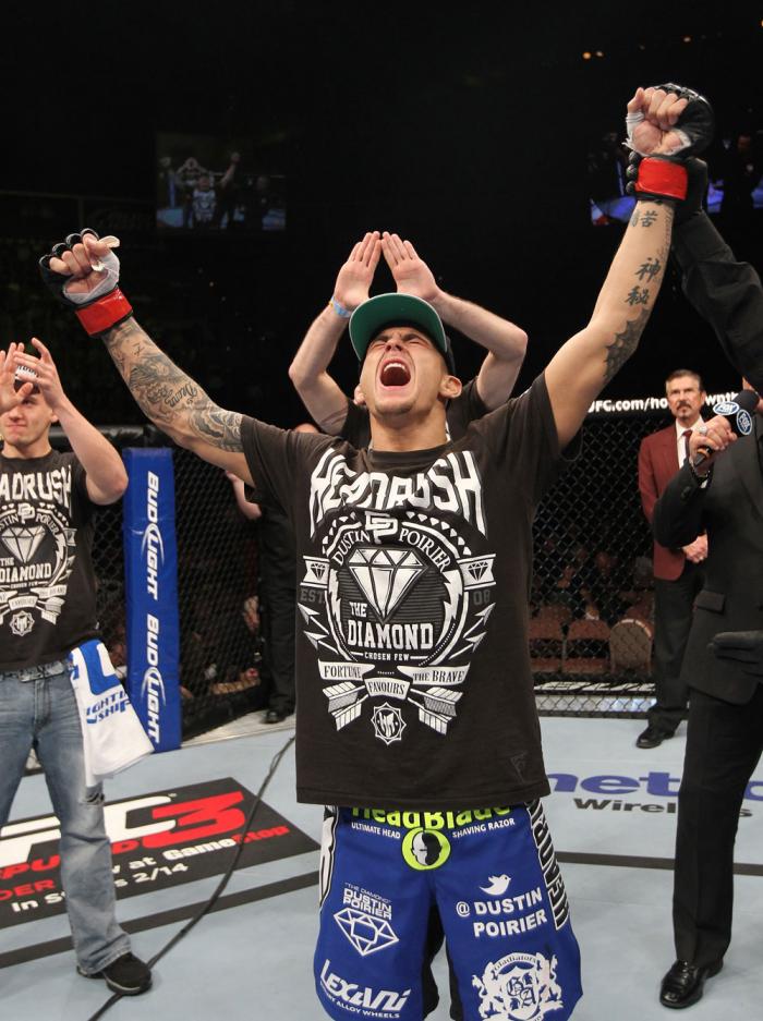 LAS VEGAS, NV - FEBRUARY 04: Dustin Poirier reacts to being declared the winner in his fight against Max Holloway during the UFC 143 event at Mandalay Bay Events Center on February 4, 2012 in Las Vegas, Nevada. (Photo by Nick Laham/Zuffa LLC/Zuffa LLC v