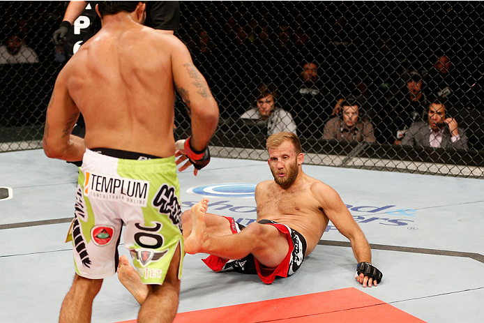 BELO HORIZONTE, BRAZIL - SEPTEMBER 04: (R-L) Tor Troeng is knocked down by a punch from Rafael Natal in their middleweight fight during the UFC on FOX Sports 1 event at Mineirinho Arena on September 4, 2013 in Belo Horizonte, Brazil. (Photo by Josh Hedge
