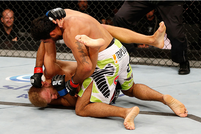 BELO HORIZONTE, BRAZIL - SEPTEMBER 04: (R-L) Rafael Natal punches Tor Troeng in their middleweight fight during the UFC on FOX Sports 1 event at Mineirinho Arena on September 4, 2013 in Belo Horizonte, Brazil. (Photo by Josh Hedges/Zuffa LLC/Zuffa LLC vi