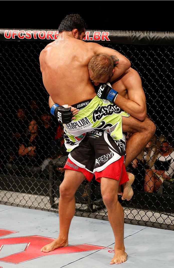 BELO HORIZONTE, BRAZIL - SEPTEMBER 04: (L-R) Rafael Natal attempts to secure a guillotine choke against Tor Troeng in their middleweight fight during the UFC on FOX Sports 1 event at Mineirinho Arena on September 4, 2013 in Belo Horizonte, Brazil. (Photo