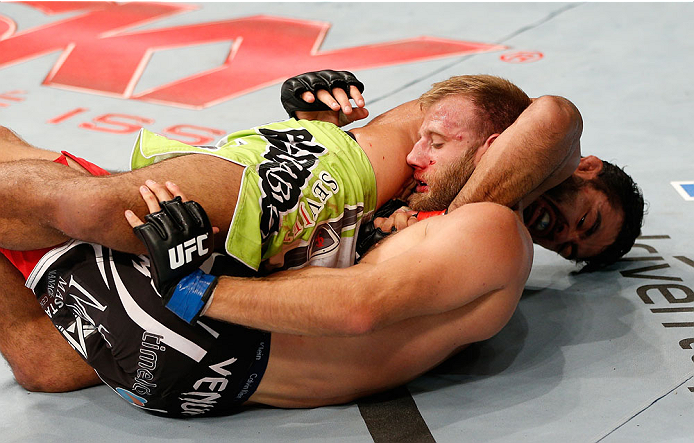 BELO HORIZONTE, BRAZIL - SEPTEMBER 04: (L-R) Rafael Natal attempts to secure a guillotine choke against Tor Troeng in their middleweight fight during the UFC on FOX Sports 1 event at Mineirinho Arena on September 4, 2013 in Belo Horizonte, Brazil. (Photo