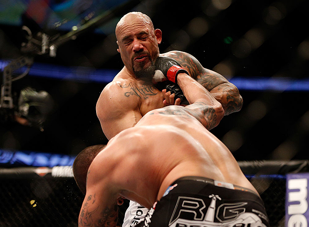 ANAHEIM, CA - FEBRUARY 23: Brendan Schaub (bottom) punches Lavar Johnson in their heavyweight bout during UFC 157 at Honda Center on February 23, 2013 in Anaheim, California. (Photo by Josh Hedges/Zuffa LLC/Zuffa LLC via Getty Images) *** Local Caption