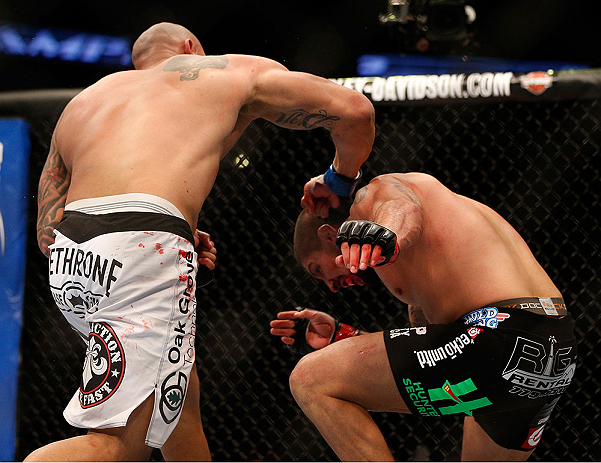 ANAHEIM, CA - FEBRUARY 23: Lavar Johnson (left) punches Brendan Schaub in their heavyweight bout during UFC 157 at Honda Center on February 23, 2013 in Anaheim, California. (Photo by Josh Hedges/Zuffa LLC/Zuffa LLC via Getty Images) *** Local Caption **