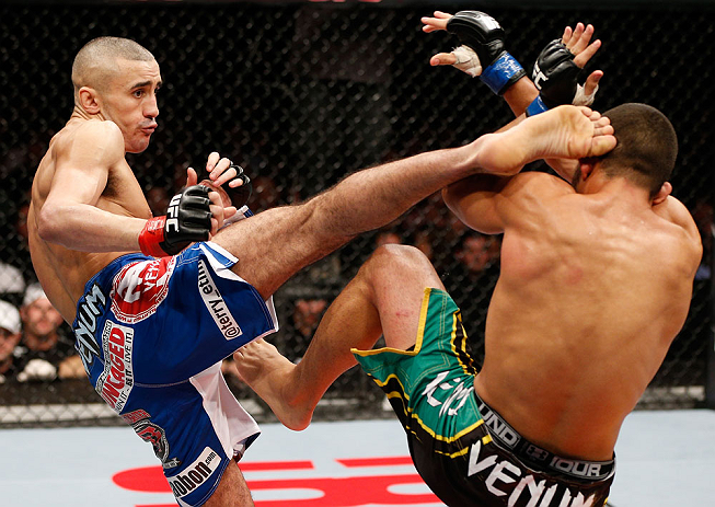 LONDON, ENGLAND - FEBRUARY 16: (L-R) Terry Etim kicks Renee Forte in their lightweight fight during the UFC on Fuel TV event on February 16, 2013 at Wembley Arena in London, England. (Photo by Josh Hedges/Zuffa LLC/Zuffa LLC via Getty Images)