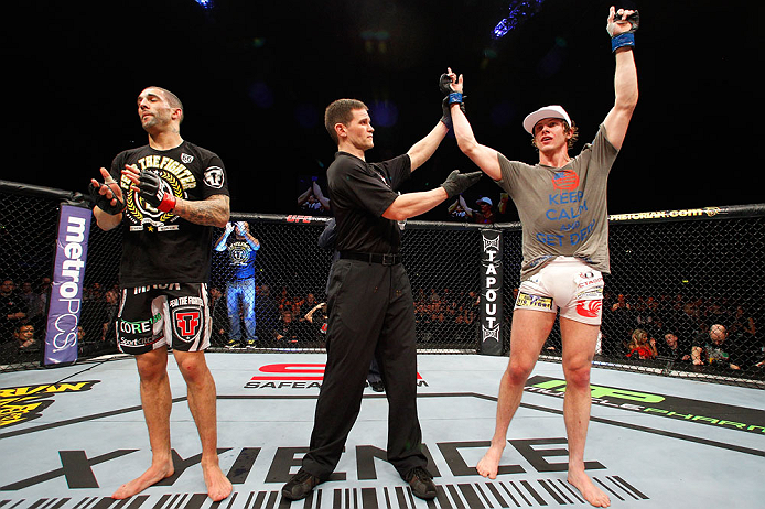 LONDON, ENGLAND - FEBRUARY 16: Matthew Riddle (R) reacts after defeating Che Mills (L) in their welterweight fight during the UFC on Fuel TV event on February 16, 2013 at Wembley Arena in London, England. (Photo by Josh Hedges/Zuffa LLC/Zuffa LLC via Ge