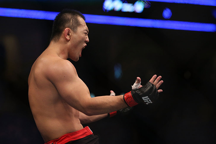 DENVER, CO - AUGUST 11: Yushin Okami reacts after defeating Buddy Roberts during their middleweight bout at UFC 150 inside Pepsi Center on August 11, 2012 in Denver, Colorado. (Photo by Josh Hedges/Zuffa LLC/Zuffa LLC via Getty Images)
