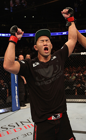 DENVER, CO - AUGUST 11: Yushin Okami reacts after defeating Buddy Roberts during their middleweight bout at UFC 150 inside Pepsi Center on August 11, 2012 in Denver, Colorado. (Photo by Nick Laham/Zuffa LLC/Zuffa LLC via Getty Images)