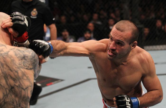 TORONTO, ON - DECEMBER 10: (R-L) Igor Pokrajac punches Krzysztof Soszynski during the UFC 140 event at Air Canada Centre on December 10, 2011 in Toronto, Ontario, Canada. (Photo by Nick Laham/Zuffa LLC/Zuffa LLC via Getty Images)