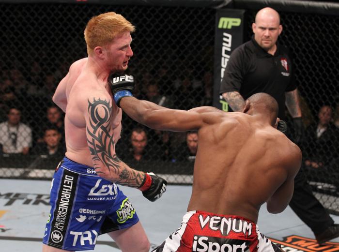 LAS VEGAS, NV - FEBRUARY 04: Clifford Starks (right) punches Ed Herman during the UFC 143 event at Mandalay Bay Events Center on February 4, 2012 in Las Vegas, Nevada. (Photo by Nick Laham/Zuffa LLC/Zuffa LLC via Getty Images) *** Local Caption *** Clif