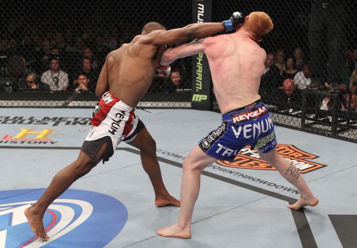 LAS VEGAS, NV - FEBRUARY 04: Clifford Starks (left) punches Ed Herman during the UFC 143 event at Mandalay Bay Events Center on February 4, 2012 in Las Vegas, Nevada. (Photo by Nick Laham/Zuffa LLC/Zuffa LLC via Getty Images) *** Local Caption *** Cliff