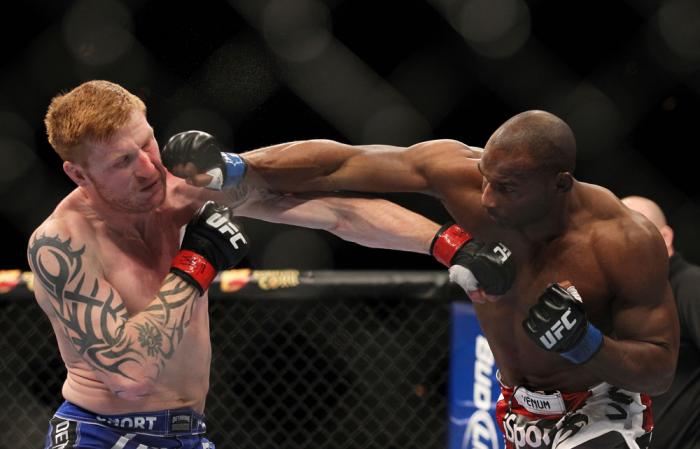 LAS VEGAS, NV - FEBRUARY 04: (L-R) Ed Herman and Clifford Starks exchange punches during the UFC 143 event at Mandalay Bay Events Center on February 4, 2012 in Las Vegas, Nevada. (Photo by Josh Hedges/Zuffa LLC/Zuffa LLC via Getty Images) *** Local Capt