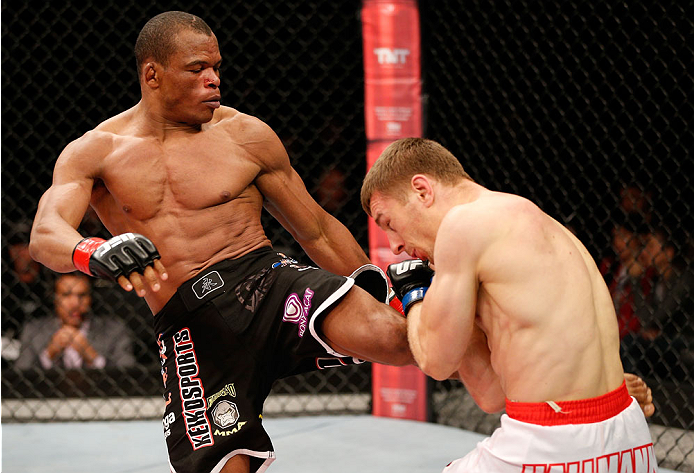 BELO HORIZONTE, BRAZIL - SEPTEMBER 04: (L-R) Francisco Trinaldo kicks Piotr Hallmann in their lightweight fight during the UFC on FOX Sports 1 event at Mineirinho Arena on September 4, 2013 in Belo Horizonte, Brazil. (Photo by Josh Hedges/Zuffa LLC/Zuffa