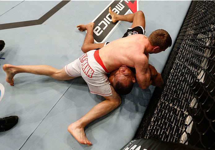 BELO HORIZONTE, BRAZIL - SEPTEMBER 04: Piotr Hallmann (top) secures a kimura submission against Francisco Trinaldo in their lightweight fight during the UFC on FOX Sports 1 event at Mineirinho Arena on September 4, 2013 in Belo Horizonte, Brazil. (Photo