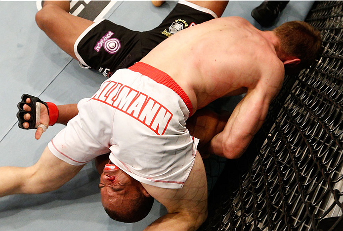 BELO HORIZONTE, BRAZIL - SEPTEMBER 04: Piotr Hallmann (top) secures a kimura submission against Francisco Trinaldo in their lightweight fight during the UFC on FOX Sports 1 event at Mineirinho Arena on September 4, 2013 in Belo Horizonte, Brazil. (Photo