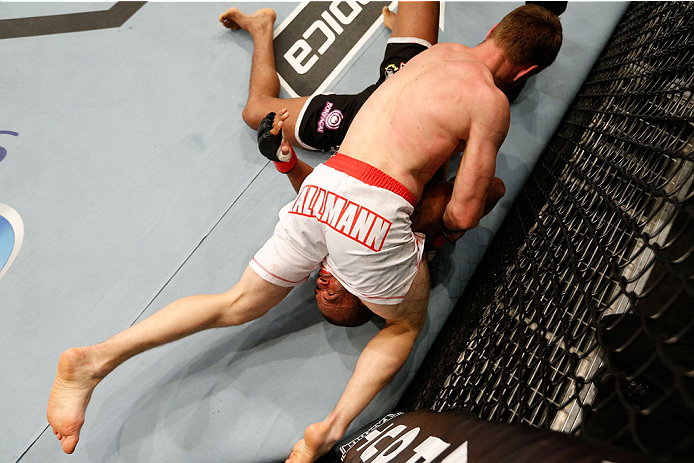 BELO HORIZONTE, BRAZIL - SEPTEMBER 04: Piotr Hallmann (top) secures a kimura submission against Francisco Trinaldo in their lightweight fight during the UFC on FOX Sports 1 event at Mineirinho Arena on September 4, 2013 in Belo Horizonte, Brazil. (Photo