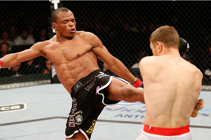 BELO HORIZONTE, BRAZIL - SEPTEMBER 04: (L-R) Francisco Trinaldo kicks Piotr Hallmann in their lightweight fight during the UFC on FOX Sports 1 event at Mineirinho Arena on September 4, 2013 in Belo Horizonte, Brazil. (Photo by Josh Hedges/Zuffa LLC/Zuffa