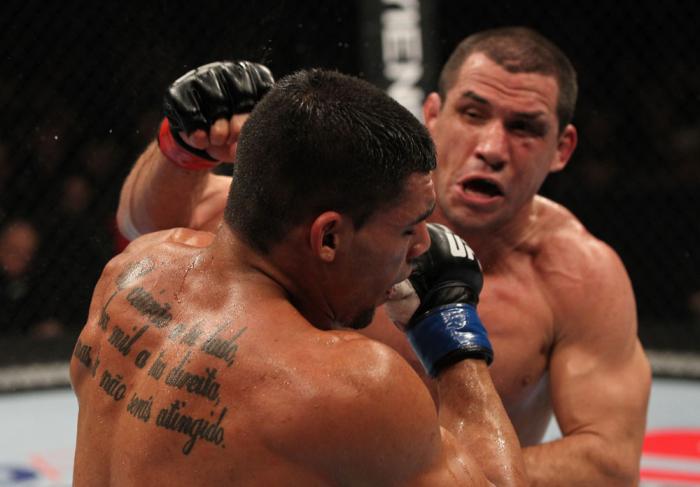 OMAHA, NE - FEBRUARY 15: (R-L) Aaron Simpson punches Ronny Markes during the UFC on FUEL TV event at Omaha Civic Auditorium on February 15, 2012 in Omaha, Nebraska. (Photo by Josh Hedges/Zuffa LLC/Zuffa LLC via Getty Images) *** Local Caption *** Aaron