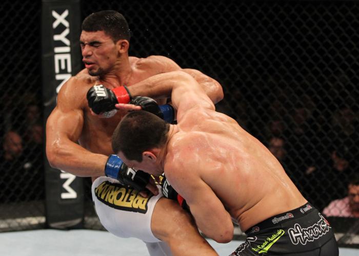 OMAHA, NE - FEBRUARY 15: (R-L) Aaron Simpson punches Ronny Markes during the UFC on FUEL TV event at Omaha Civic Auditorium on February 15, 2012 in Omaha, Nebraska. (Photo by Josh Hedges/Zuffa LLC/Zuffa LLC via Getty Images) *** Local Caption *** Aaron