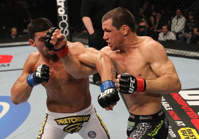 OMAHA, NE - FEBRUARY 15: (R-L) Aaron Simpson and Ronny Markes trade punches during the UFC on FUEL TV event at Omaha Civic Auditorium on February 15, 2012 in Omaha, Nebraska. (Photo by Josh Hedges/Zuffa LLC/Zuffa LLC via Getty Images) *** Local Caption