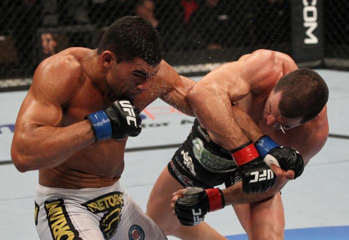 OMAHA, NE - FEBRUARY 15: (R-L) Aaron Simpson and Ronny Markes trade punches during the UFC on FUEL TV event at Omaha Civic Auditorium on February 15, 2012 in Omaha, Nebraska. (Photo by Josh Hedges/Zuffa LLC/Zuffa LLC via Getty Images) *** Local Caption