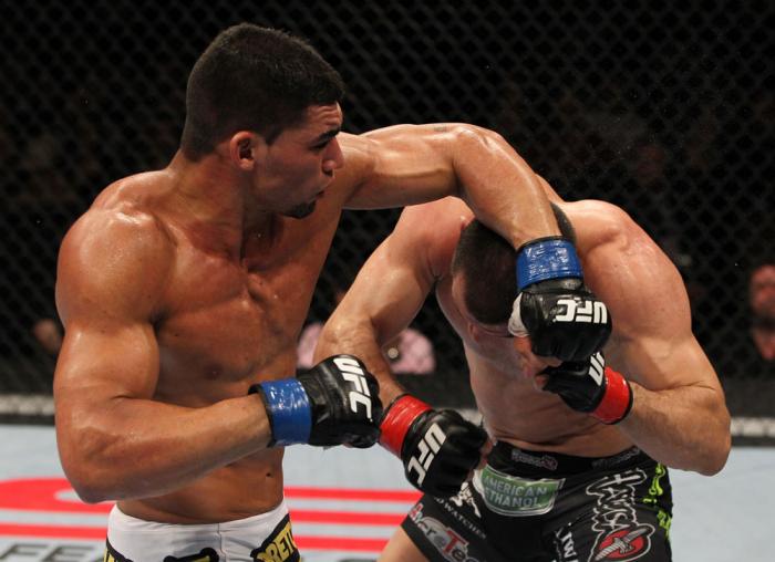 OMAHA, NE - FEBRUARY 15: (L-R) Ronny Markes punches Aaron Simpson during the UFC on FUEL TV event at Omaha Civic Auditorium on February 15, 2012 in Omaha, Nebraska. (Photo by Josh Hedges/Zuffa LLC/Zuffa LLC via Getty Images) *** Local Caption *** Aaron