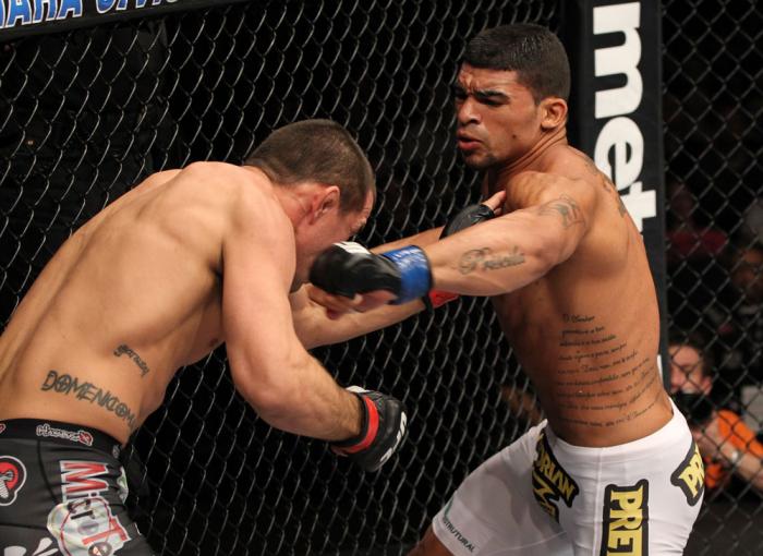 OMAHA, NE - FEBRUARY 15: (R-L) Ronny Markes punches Aaron Simpson during the UFC on FUEL TV event at Omaha Civic Auditorium on February 15, 2012 in Omaha, Nebraska. (Photo by Josh Hedges/Zuffa LLC/Zuffa LLC via Getty Images) *** Local Caption *** Aaron