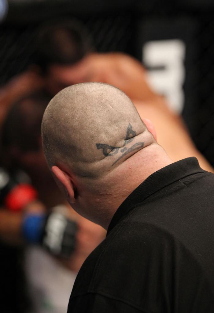 OMAHA, NE - FEBRUARY 15: The referee looks on during the Simpson v Markes bout during the UFC on FUEL TV event at Omaha Civic Auditorium on February 15, 2012 in Omaha, Nebraska. (Photo by Josh Hedges/Zuffa LLC/Zuffa LLC via Getty Images) *** Local Capti