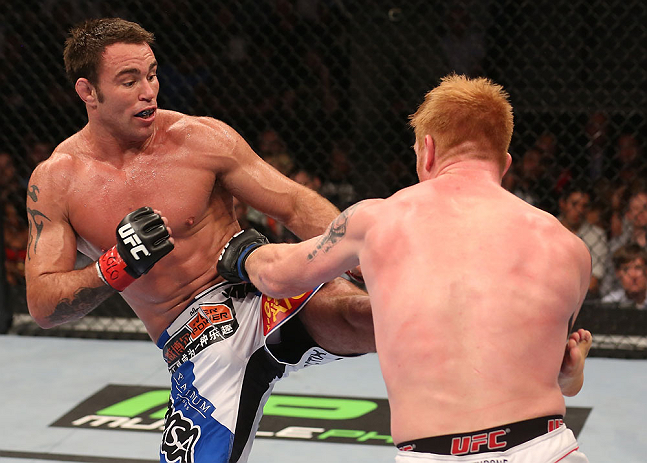 DENVER, CO - AUGUST 11: (L-R) Jake Shields kicks Ed Herman during their middleweight bout at UFC 150 inside Pepsi Center on August 11, 2012 in Denver, Colorado. (Photo by Nick Laham/Zuffa LLC/Zuffa LLC via Getty Images)