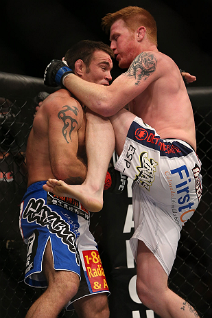 DENVER, CO - AUGUST 11: (R-L) Ed Herman delivers a knee strike to the head of Jake Shields during their middleweight bout at UFC 150 inside Pepsi Center on August 11, 2012 in Denver, Colorado. (Photo by Josh Hedges/Zuffa LLC/Zuffa LLC via Getty Images)