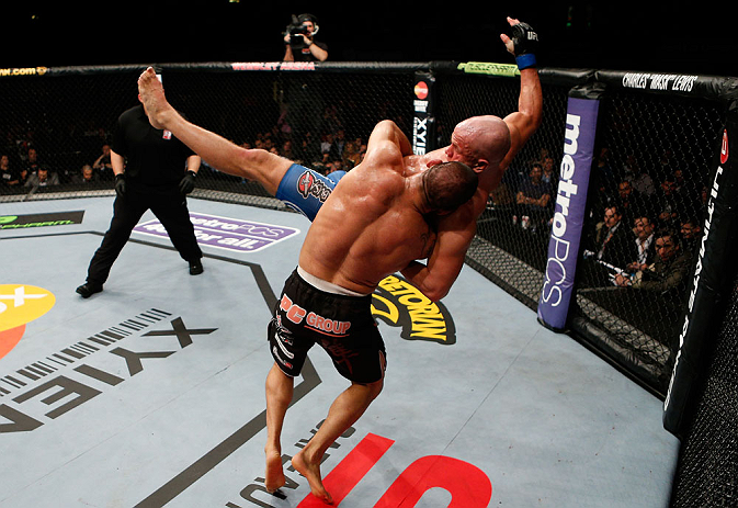 LONDON, ENGLAND - FEBRUARY 16: (L-R) James Te Huna takes down Ryan Jimmo in their light heavyweight fight during the UFC on Fuel TV event on February 16, 2013 at Wembley Arena in London, England. (Photo by Josh Hedges/Zuffa LLC/Zuffa LLC via Getty Image