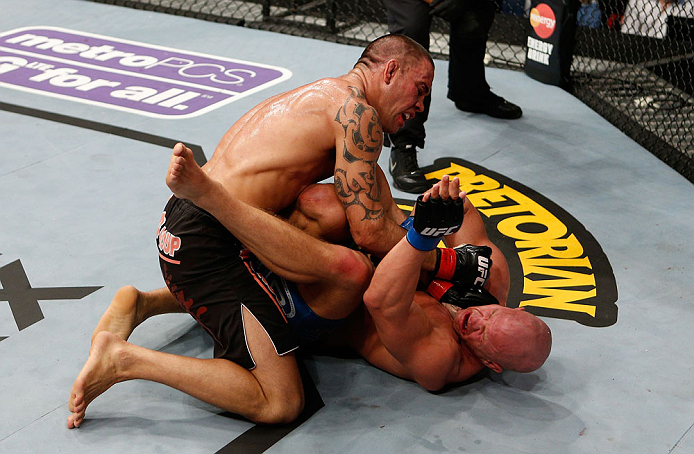 LONDON, ENGLAND - FEBRUARY 16: (L-R) James Te Huna punches Ryan Jimmo in their light heavyweight fight during the UFC on Fuel TV event on February 16, 2013 at Wembley Arena in London, England. (Photo by Josh Hedges/Zuffa LLC/Zuffa LLC via Getty Images)