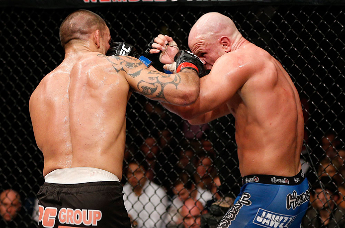 LONDON, ENGLAND - FEBRUARY 16: (L-R) James Te Huna punches Ryan Jimmo in their light heavyweight fight during the UFC on Fuel TV event on February 16, 2013 at Wembley Arena in London, England. (Photo by Josh Hedges/Zuffa LLC/Zuffa LLC via Getty Images)