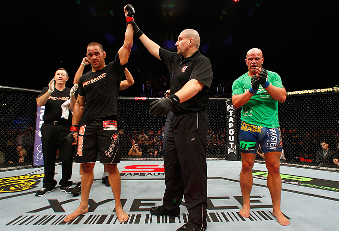 LONDON, ENGLAND - FEBRUARY 16: James Te Huna (L) reacts after defeating Ryan Jimmo (R) in their light heavyweight fight during the UFC on Fuel TV event on February 16, 2013 at Wembley Arena in London, England. (Photo by Josh Hedges/Zuffa LLC/Zuffa LLC v