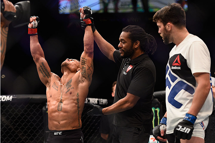 LAS VEGAS, NV - JANUARY 02: Abel Trujillo (left) reacts to his victory over Tony Sims (right) in their lightweight bout during the UFC 195 event inside MGM Grand Garden Arena on January 2, 2016 in Las Vegas, Nevada. (Photo by Jeff Bottari/Zuffa LLC/Zuffa