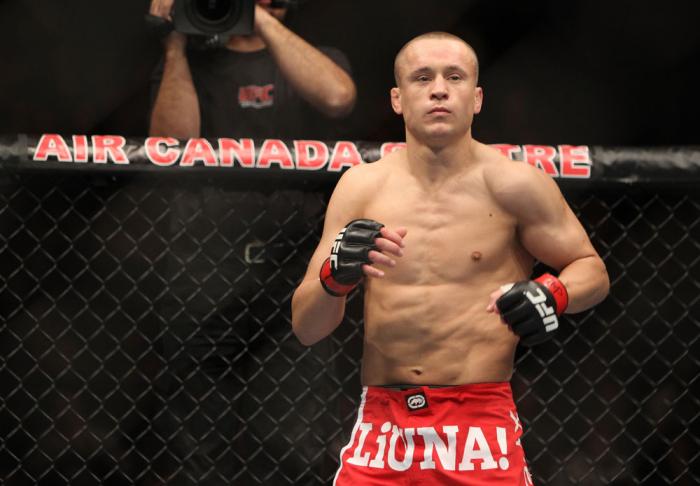 TORONTO, ON - DECEMBER 10: Mark Hominick of London, Ontario stands in the Octagon before his bout with Chan Sung Jung during the UFC 140 event at Air Canada Centre on December 10, 2011 in Toronto, Ontario, Canada. (Photo by Josh Hedges/Zuffa LLC/Zuffa L
