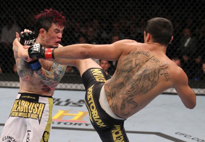 LAS VEGAS, NV - FEBRUARY 04: Renan Barao (right) kicks Scott Jorgensen during the UFC 143 event at Mandalay Bay Events Center on February 4, 2012 in Las Vegas, Nevada. (Photo by Nick Laham/Zuffa LLC/Zuffa LLC via Getty Images) *** Local Caption *** Rena