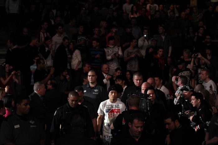 TORONTO, ON - DECEMBER 10: "The Korean Zombie" Chan Sung Jung enters the arena before his bout against Mark Hominick during the UFC 140 event at Air Canada Centre on December 10, 2011 in Toronto, Ontario, Canada. (Photo by Nick Laham/Zuffa LLC/Zuffa LLC