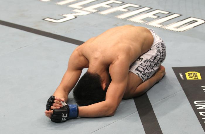 TORONTO, ON - DECEMBER 10: "The Korean Zombie" Chan Sung Jung reacts after knocking out Mark Hominick during the UFC 140 event at Air Canada Centre on December 10, 2011 in Toronto, Ontario, Canada. (Photo by Nick Laham/Zuffa LLC/Zuffa LLC via Getty Imag