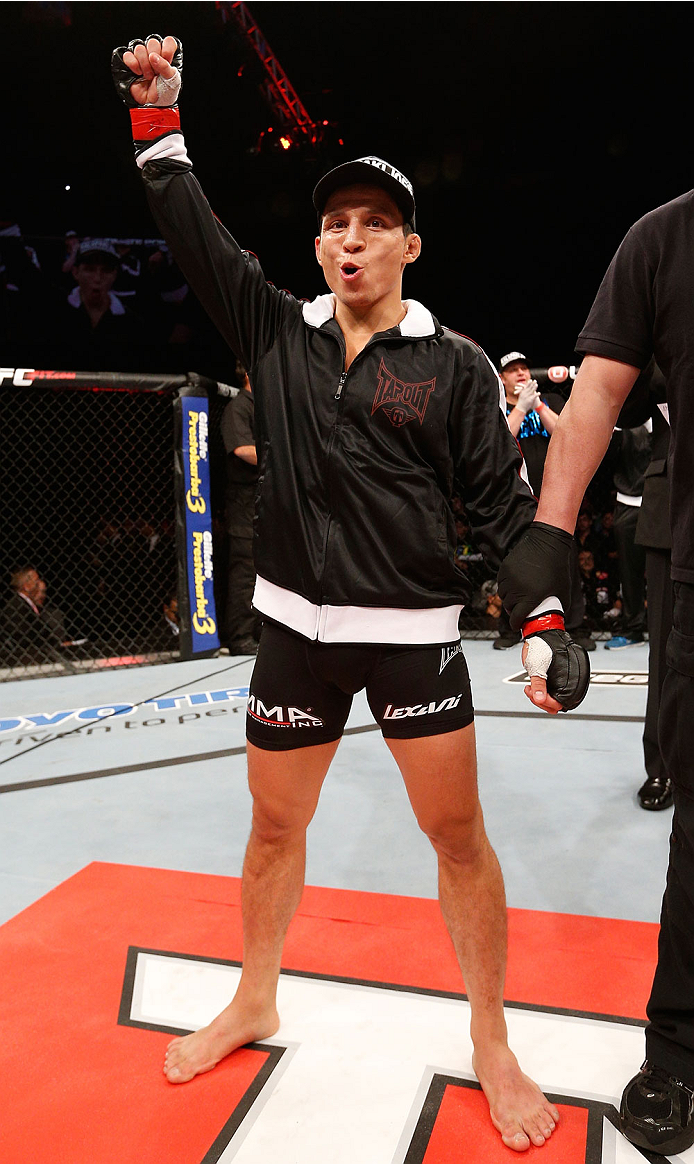 BELO HORIZONTE, BRAZIL - SEPTEMBER 04: Joseph Benavidez reacts after his knockout victory over Jussier Formiga in the flyweight fight during the UFC on FOX Sports 1 event at Mineirinho Arena on September 4, 2013 in Belo Horizonte, Brazil. (Photo by Josh